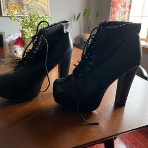 High heeled black boots